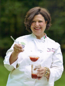 Teresa Coppola Morgan ladeling 825 MAIN Marinara Sauce into a jar